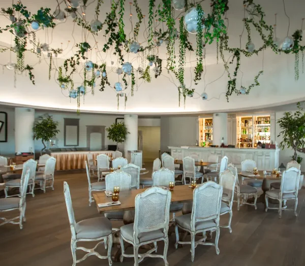 cozy-cafeteria-event-hall-with-white-furniture-imaeg fun zone party rentals